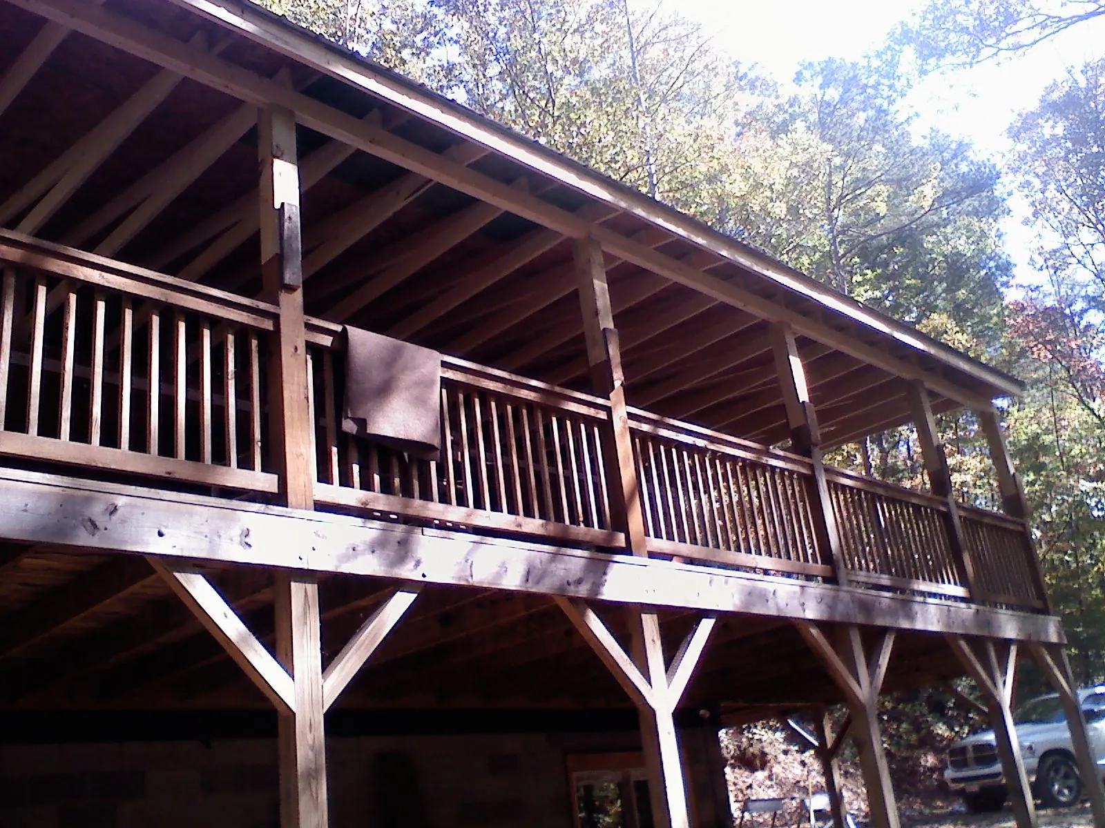 Timber framing under a new elevated porch and deck — Roof Leak Repair in Belt by Roofing Brothers